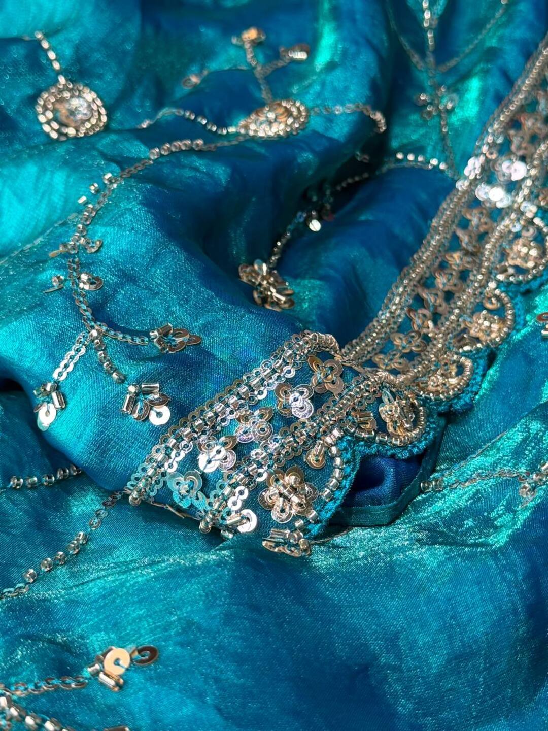 Peacock Blue Ambourding Georgette Silk Saree