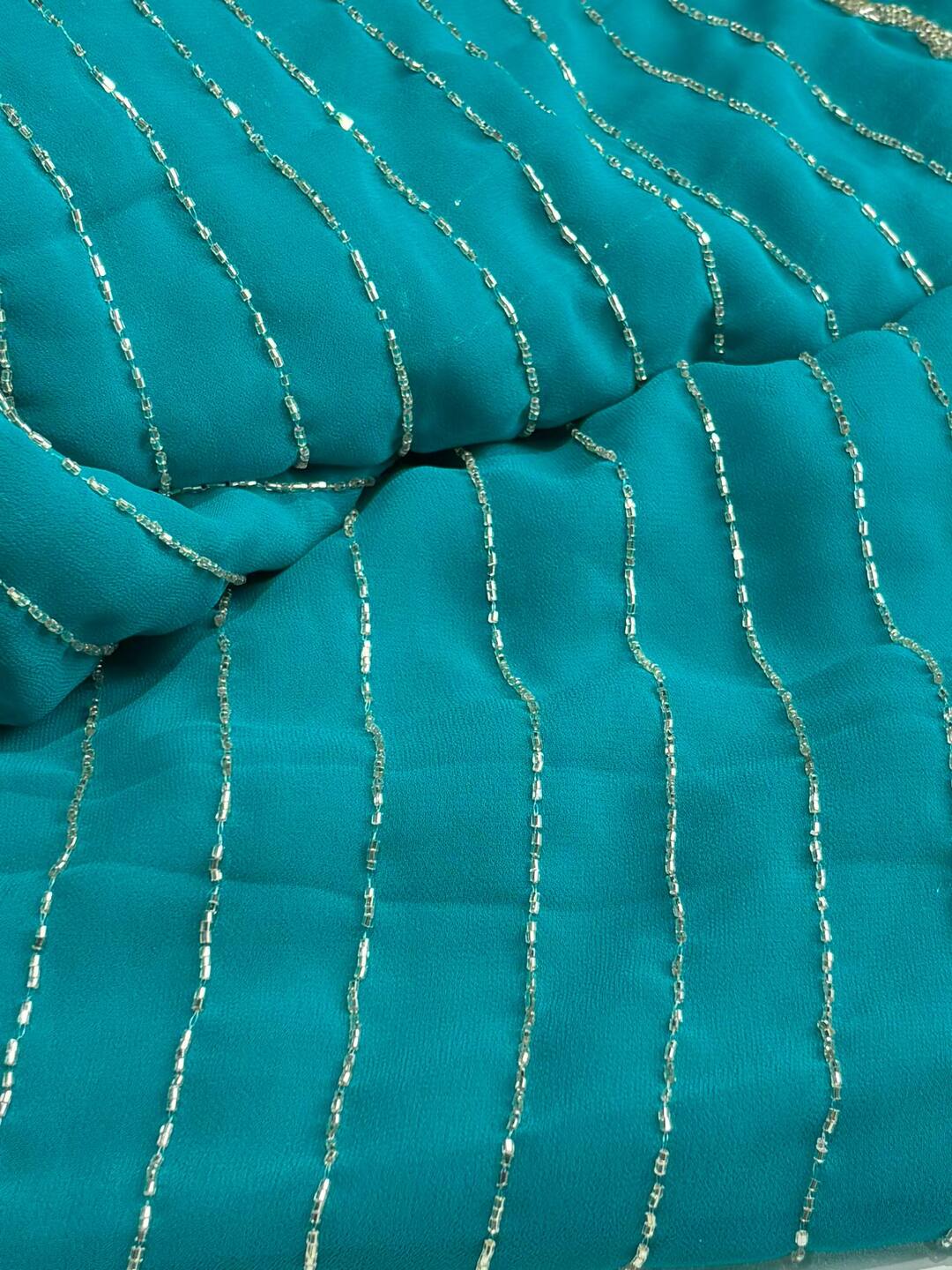 Turquoise Blue Ambourding Georgette Silk Saree