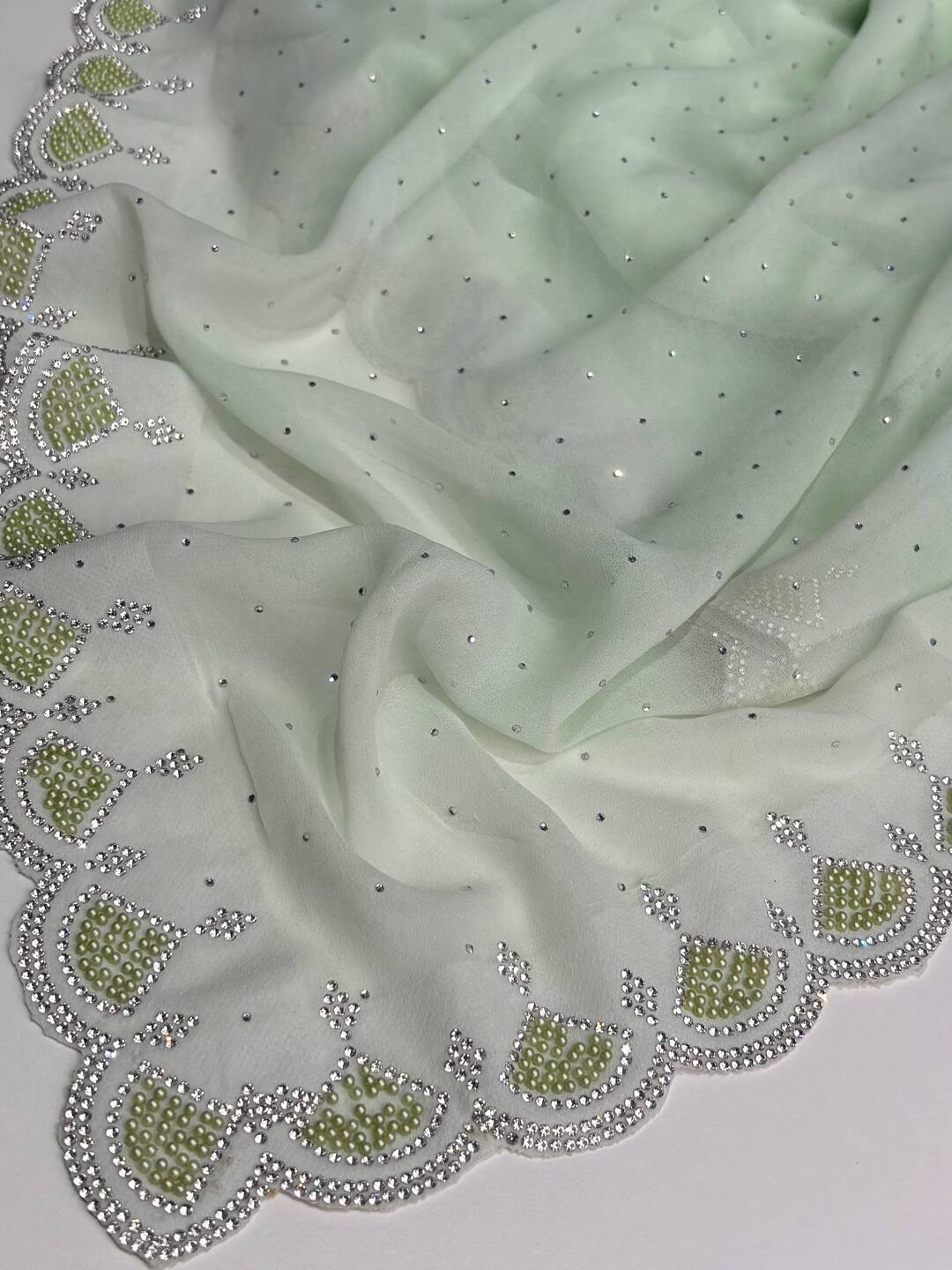 Pastel Green Georgette saree