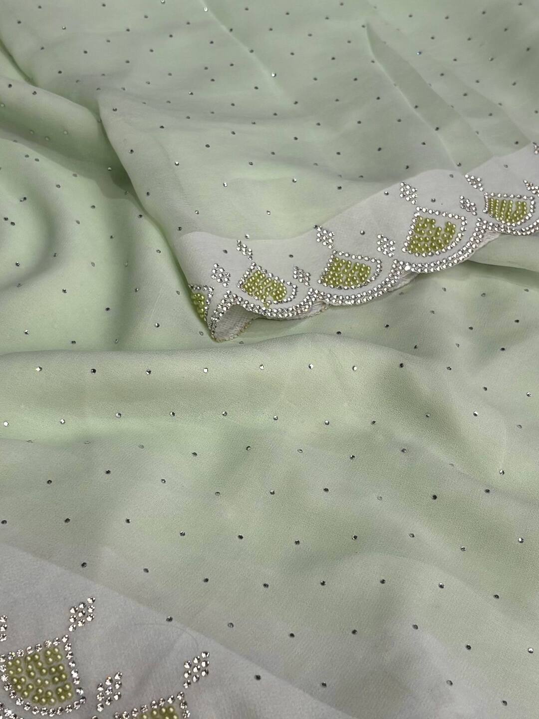 Pastel Green Georgette saree