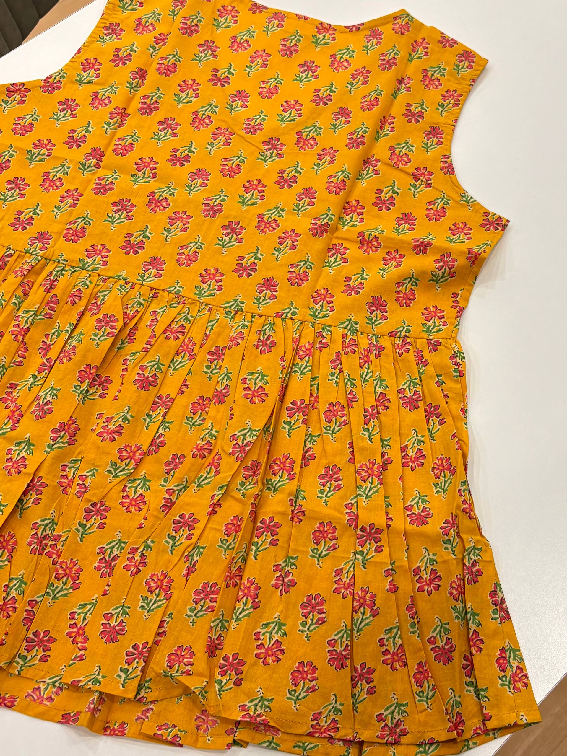 Yellow Floral Sleeveless Short Kurti