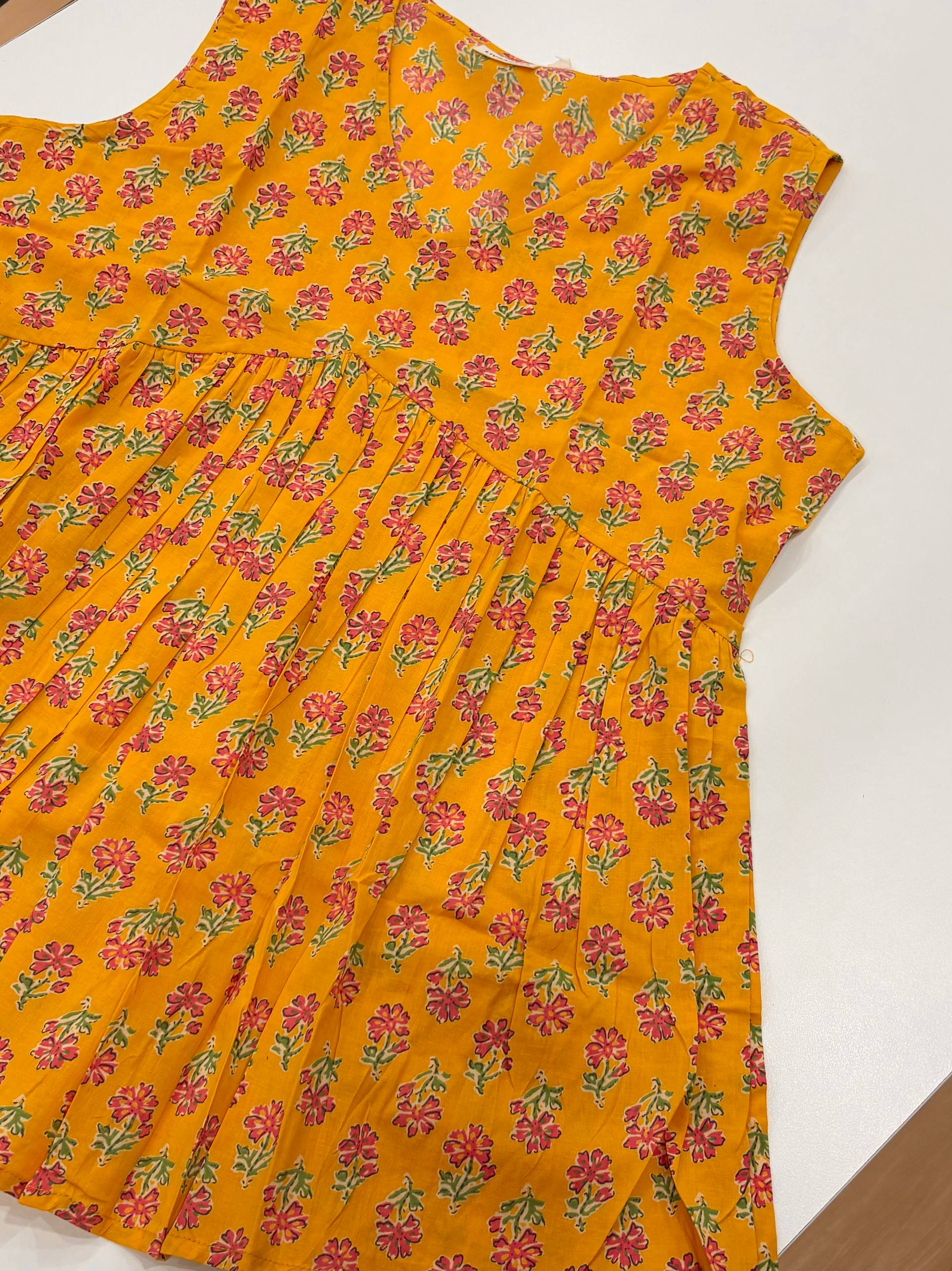 Yellow Floral Sleeveless Short Kurti
