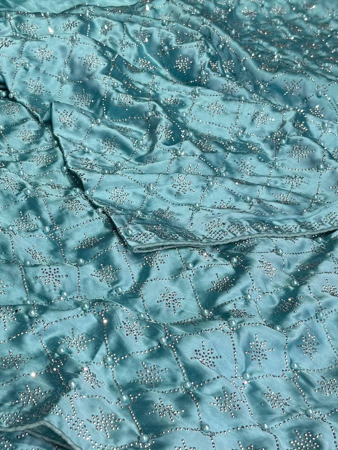 Turquoise Blue Georgette saree